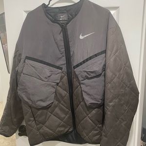 Nike readyrun jacket used defect on the sleeve